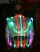 Lighted Bicycling Vest With Artistic Battery Cage