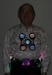 Model Wearing Led Art Necklace And Silk Shirt