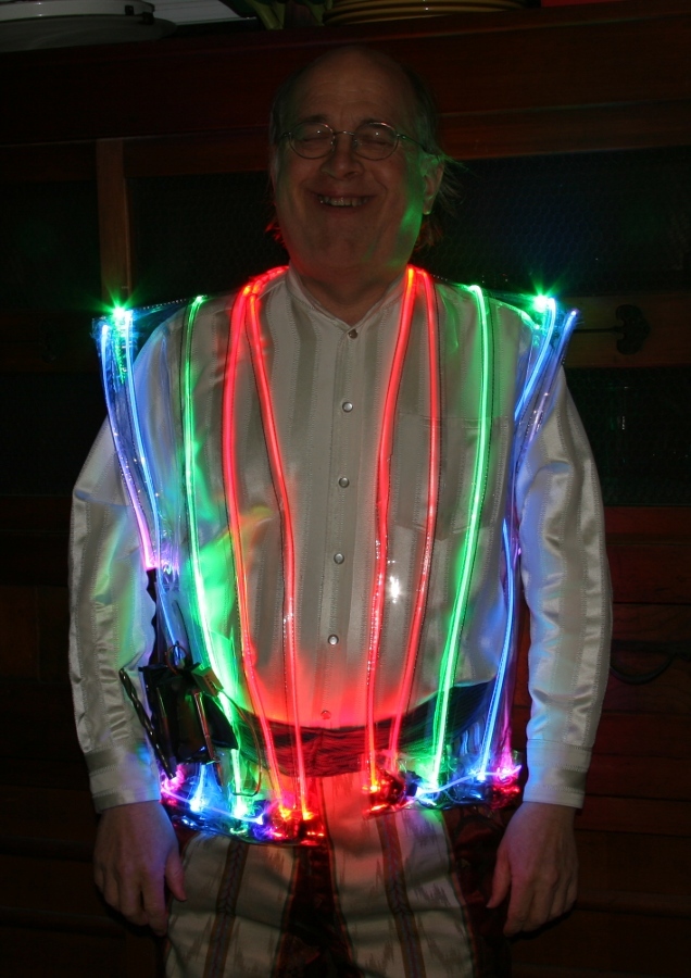 Lighted Bicycling Vest With Artistic Battery Cage